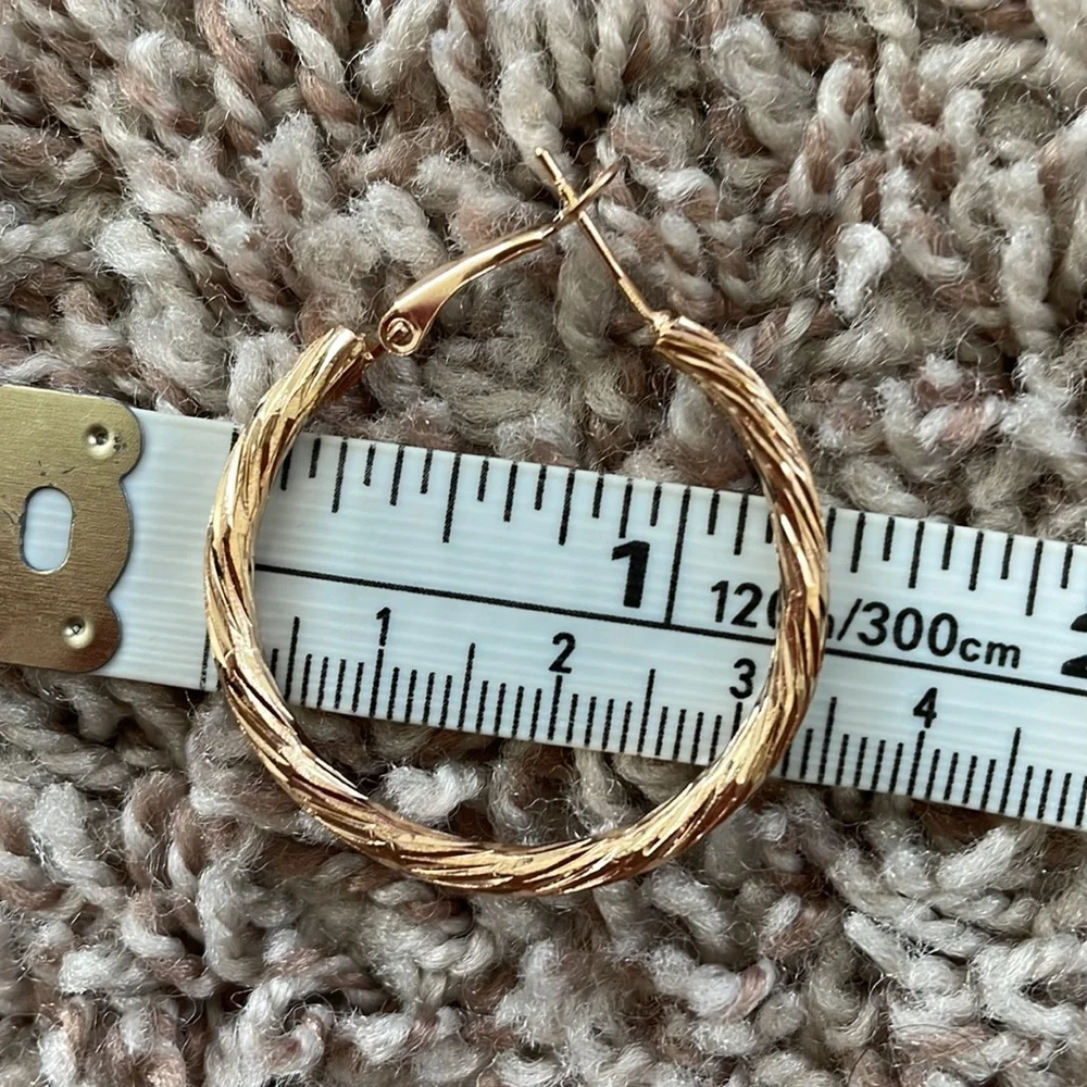 Small textured gold hoop earrings